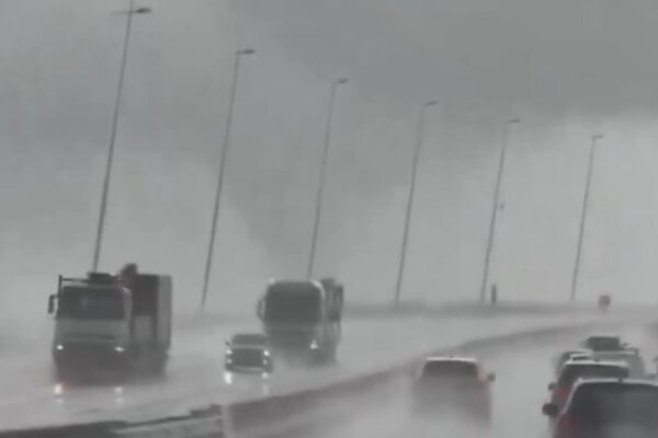 An impressive tornado surprises drivers crossing a bridge in Lisbon