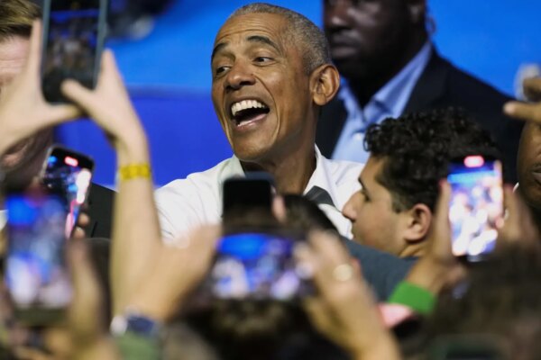 Obama, Springsteen and John Legend unite their voices against Trump at a rally in Philadelphia