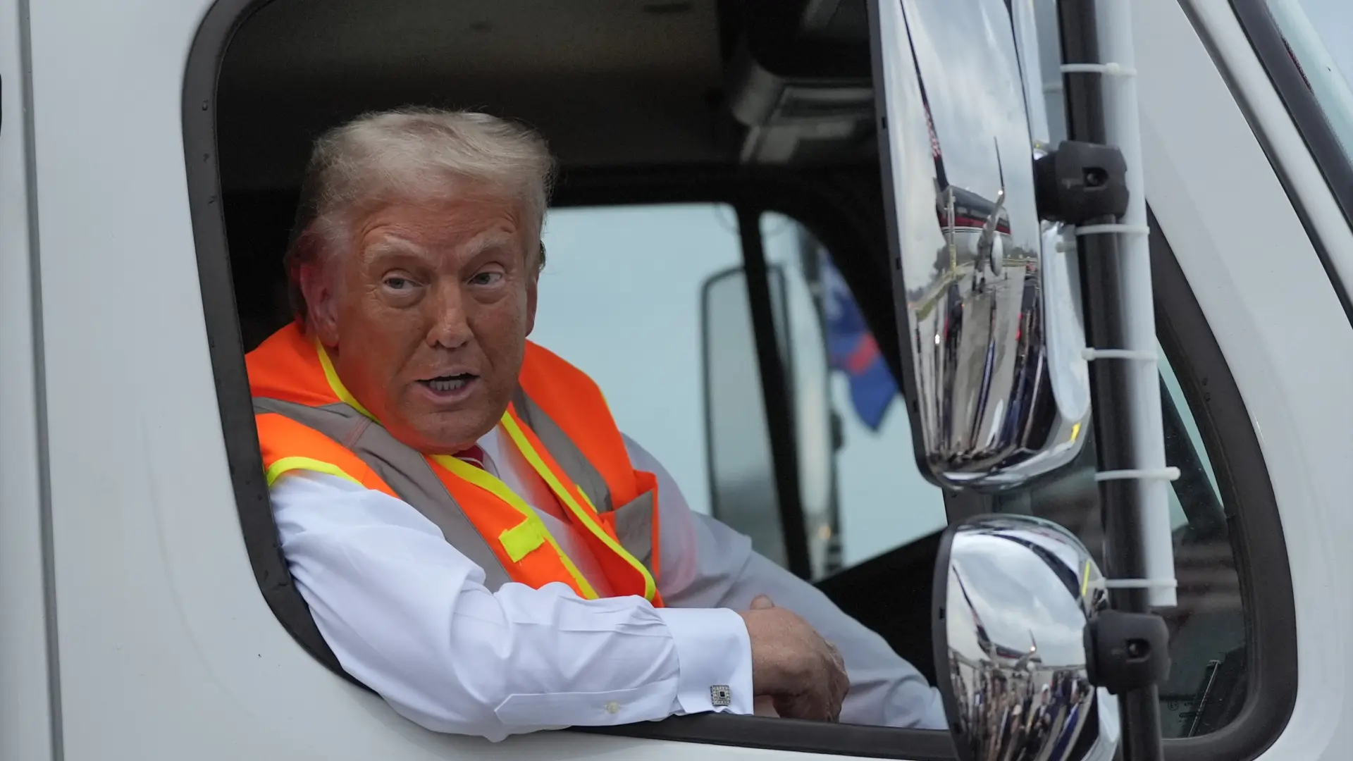 Trump arrives at rally in garbage truck after Biden's criticism